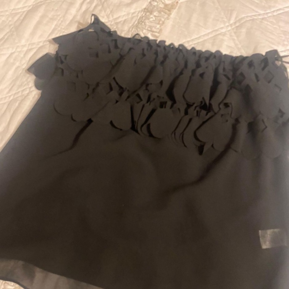 Black strapless top with cutout detail